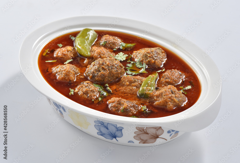 Kofta Curry, Delicious and spicy meat balls cooked in spicy thick gravy. Famous cuisine of Pakistan and India Kofta Curry, Delicious and spicy meat balls cooked in spicy thick gravy. Famous cuisine of Pakistan and India