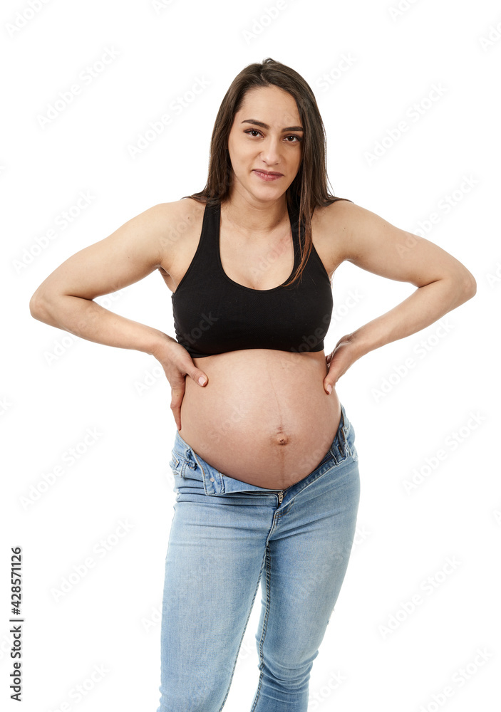 Pregnant woman upset with her too tight jeans Pregnant woman upset with her too tight jeans