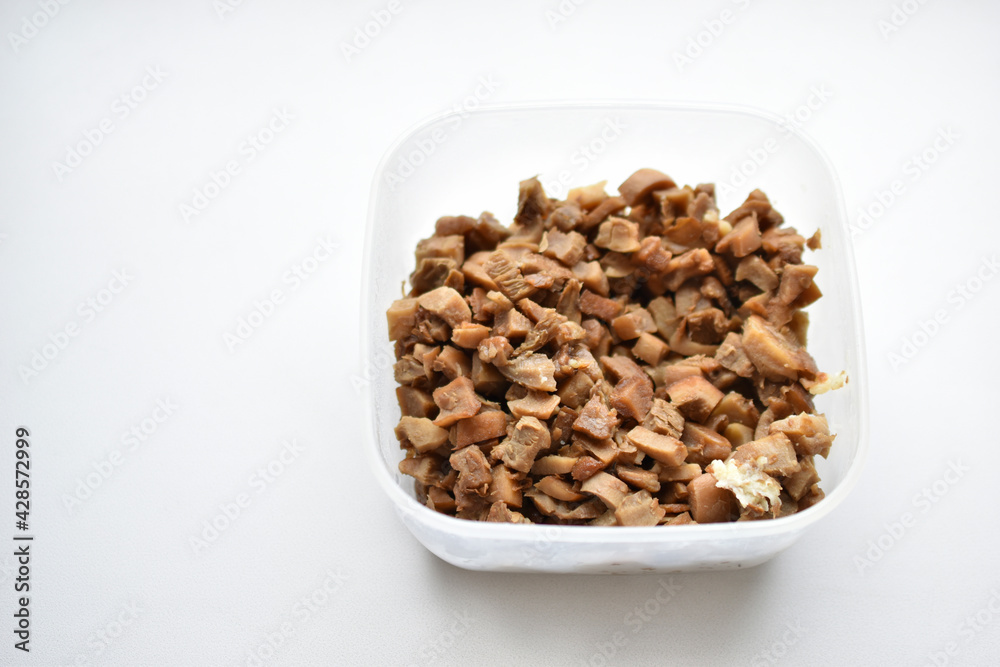 Fried pieces of delicious mushrooms in a container Fried pieces of delicious mushrooms in a container