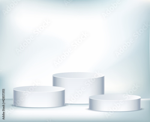  Realistic vector cylindric podium for your product design. Template contains three empty stages and light effects