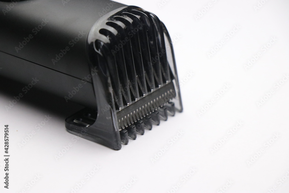 Close up of trimmer head with clip on white background Close up of trimmer head with clip on white background
