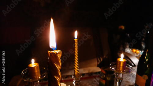 Obraz na płótnie Candles on the festive table w salonie
