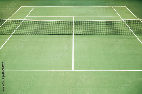 Empty green tennis court. Nobody. Top view.