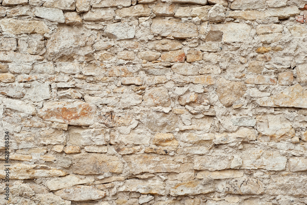 Plaster on a yellow wall. Concrete wall texture close up. Plaster on a yellow wall. Concrete wall texture close up.