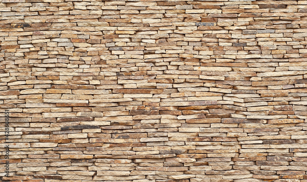 Fototapeta premium Plaster on a yellow wall. Concrete wall texture close up.