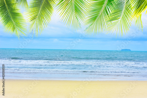 Vacation beach with palm trees leaf © kittiyaporn1027