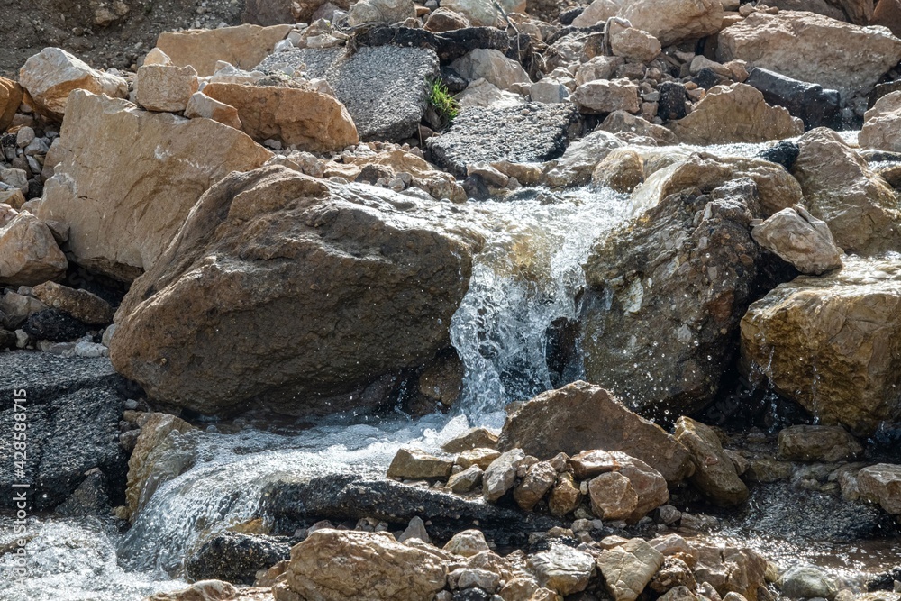 small stream of meltwater in a remote mountain region in Lebanon small stream of meltwater in a remote mountain region in Lebanon