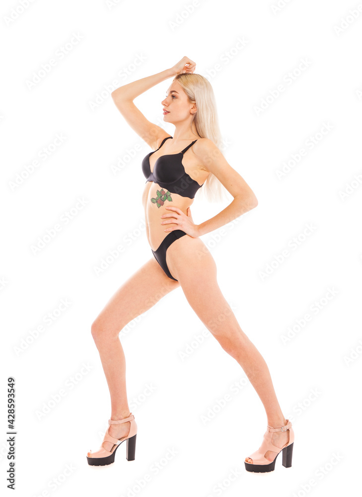 Full body portrait of a young beautiful blonde woman