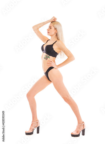 Full body portrait of a young beautiful blonde woman