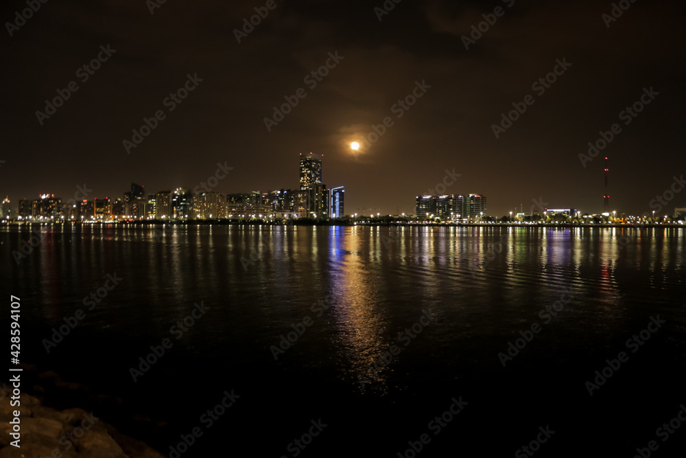 view of the city skyline at night, Abu Dhabi