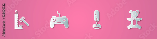 Set paper cut Striker attraction with hammer, Gamepad, Tree and Teddy bear plush toy icon. Paper art style. Vector
