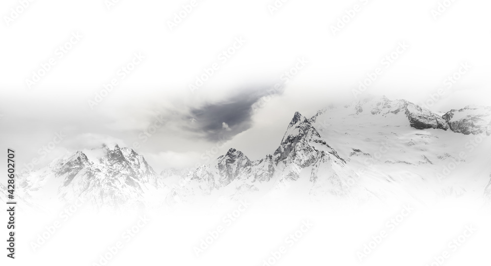 Black and white panorama of gray high mountain peaks with ice