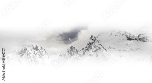 Black and white panorama of gray high mountain peaks with ice © BSANI