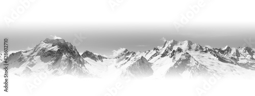 Black and white panoramic view of snow-capped mountain peaks