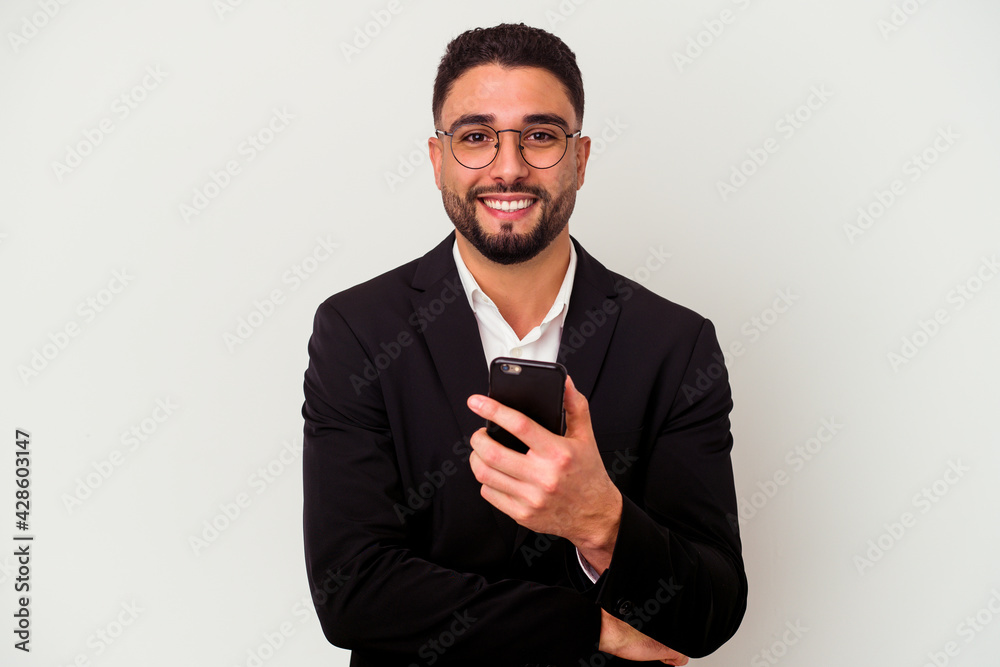 Young mixed race business man holding a mobile phone man isolated on white background Young mixed race business man holding a mobile phone man isolated on white background