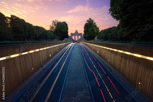 Triumphal Arch and Belliard Tunnel in the Cinquantenaire (50th anniversary) Park at the sunrise. Brussels. Belgium photo