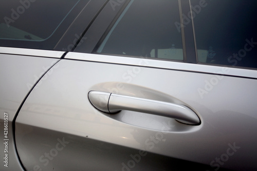 Handle of a silver car door