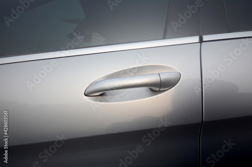 Handle of a silver car door