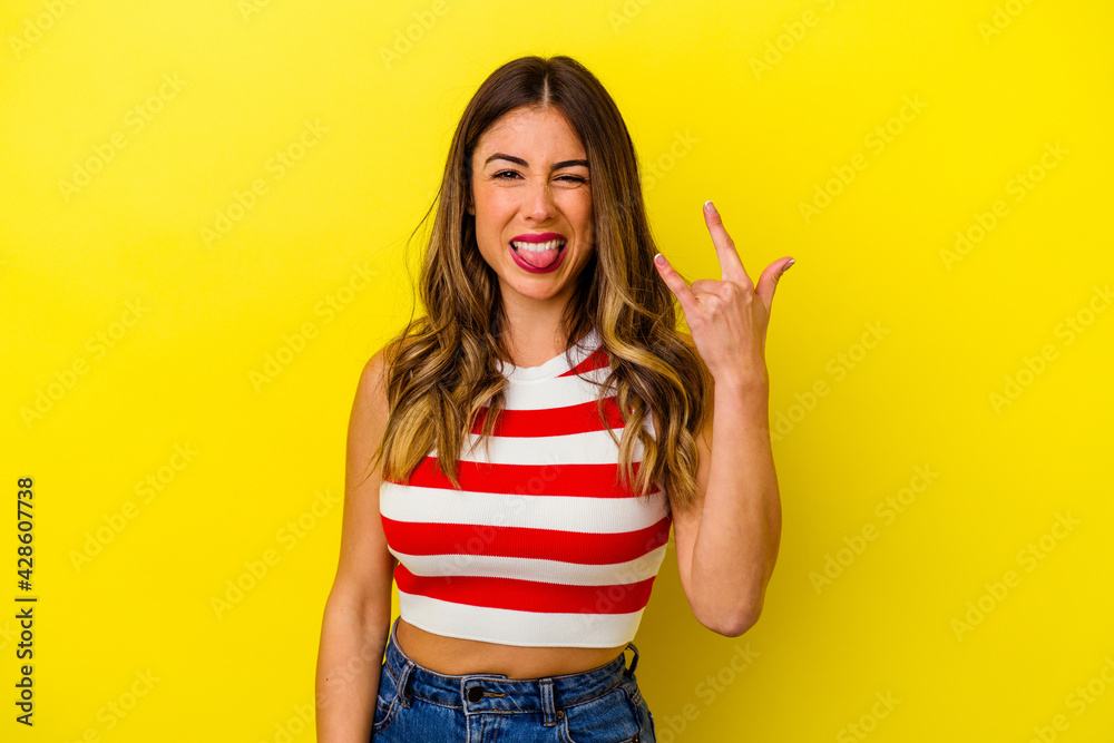 Young caucasian woman isolated on yellow background Young caucasian woman isolated on yellow background