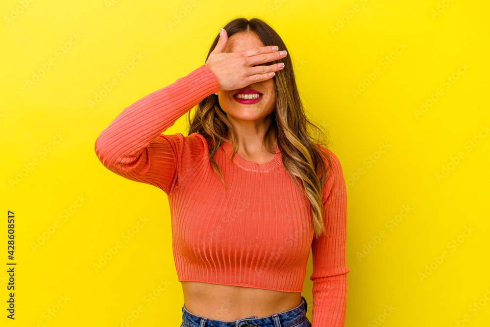 Young caucasian woman isolated on yellow background Young caucasian woman isolated on yellow background