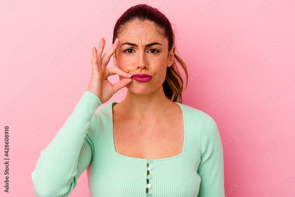 Young caucasian woman isolated on pink background Young caucasian woman isolated on pink background