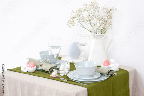Beautiful Easter table setting with blue plate.