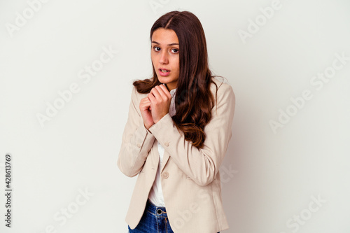 Young Indian business woman isolated on white background scared and afraid.