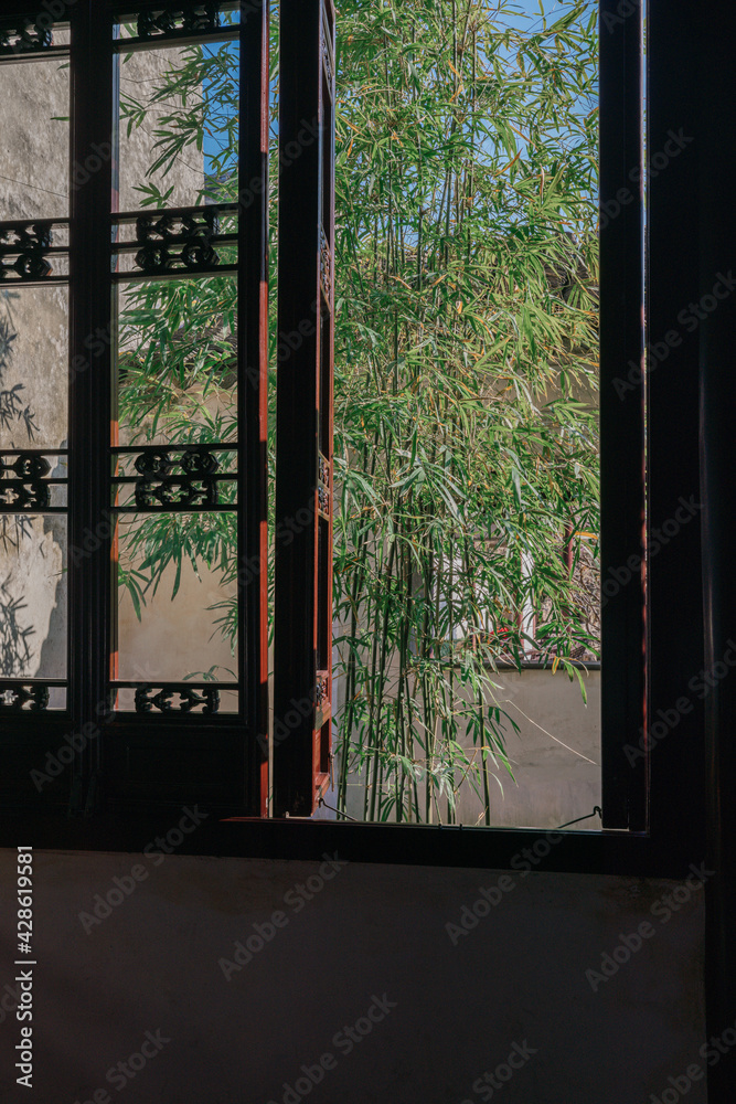 Landscape and buildings in Master of the Nets Garden, a classical Chinese garden in Suzhou, China Landscape and buildings in Master of the Nets Garden, a classical Chinese garden in Suzhou, China