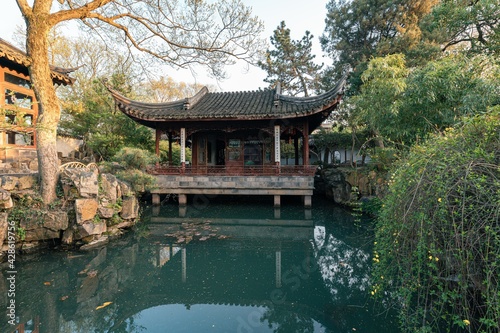 Landscape and buildings in Couple's Retreat Garden, a classical Chinese garden in Suzhou, China