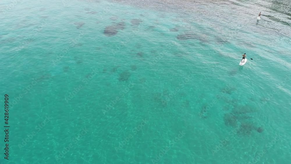 Stand up paddle board area with people. Best place for summer sports. Beautiful aerial footage of the ocean Cinema scene short film. Summer theme 4k footage. Explore the ocean. People paddle boarding Stand up paddle board area with people. Best place for summer sports. Beautiful aerial footage of the ocean Cinema scene short film. Summer theme 4k footage. Explore the ocean. People paddle boarding