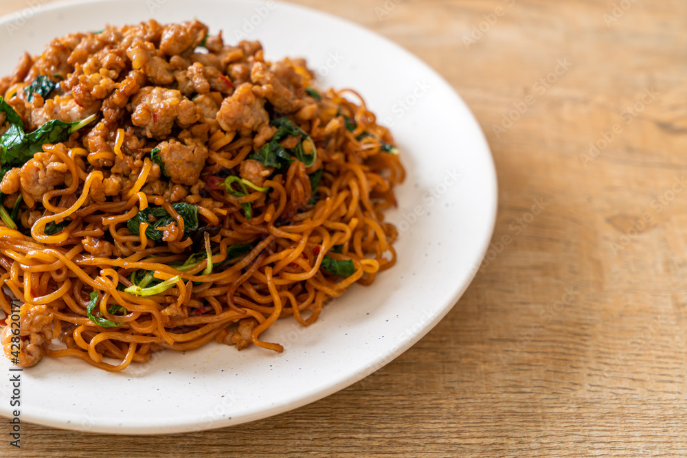 stir-fried instant noodles with Thai basil and minced pork stir-fried instant noodles with Thai basil and minced pork