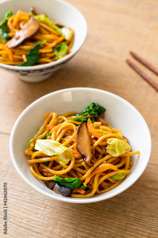 yakisoba noodles stir-fried with vegetable in asian style - vegan and vegetarian food yakisoba noodles stir-fried with vegetable in asian style - vegan and vegetarian food