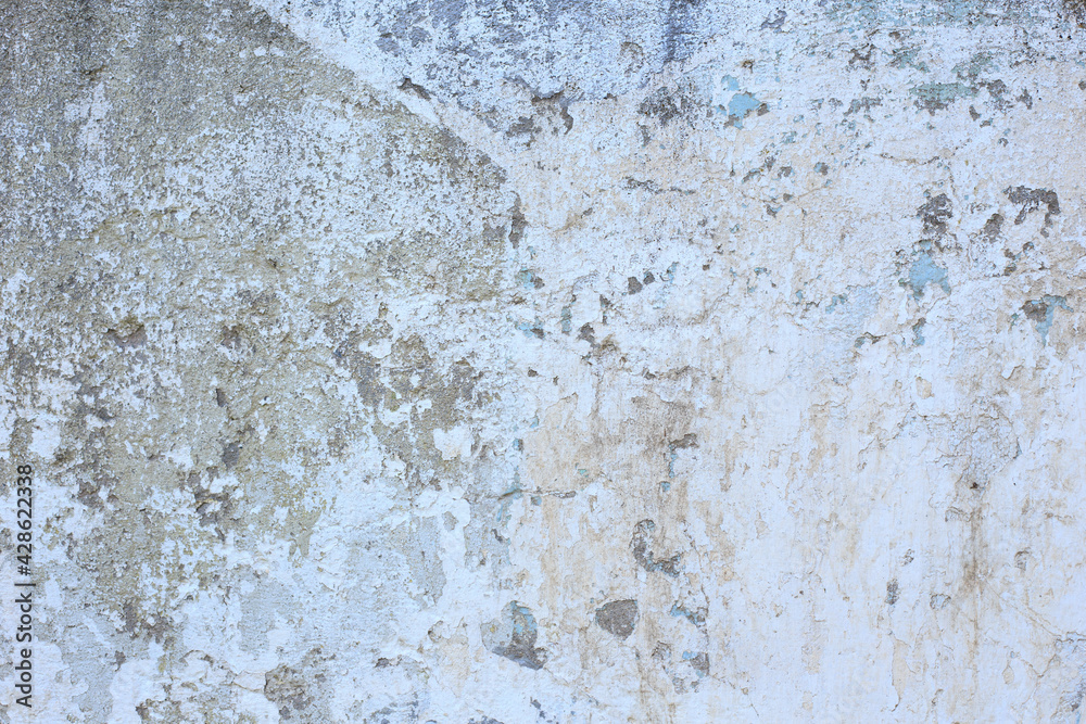 The texture of the old wall. Abstract background. White old paint