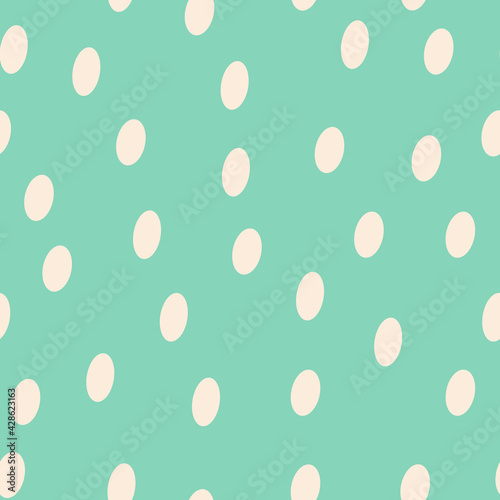 Oval spots. Polka dot fabric. An infinite number of pink pasteldots. Seamless blue pattern for textiles, paper, packaging, curtains, pillows, bedspreads, bed linen. Actual colors.  photo