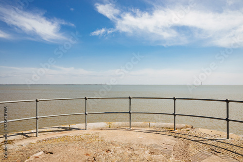 Iron railing on a pier on the North Sea. 