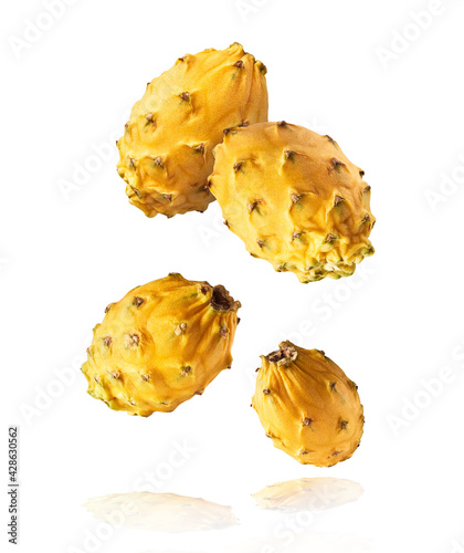 creative image with fresh yellow pitaya falling in the air, zero gravity food conception