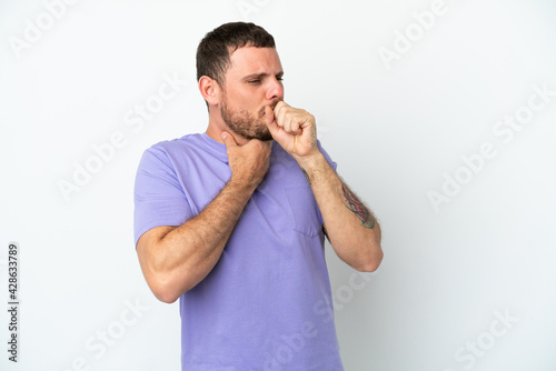 Young Brazilian man isolated on white background coughing a lot