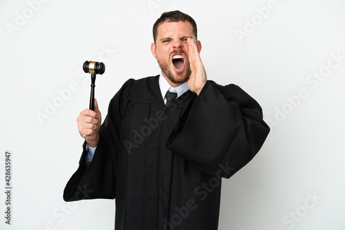 Judge caucasian man isolated on white background shouting with mouth wide open