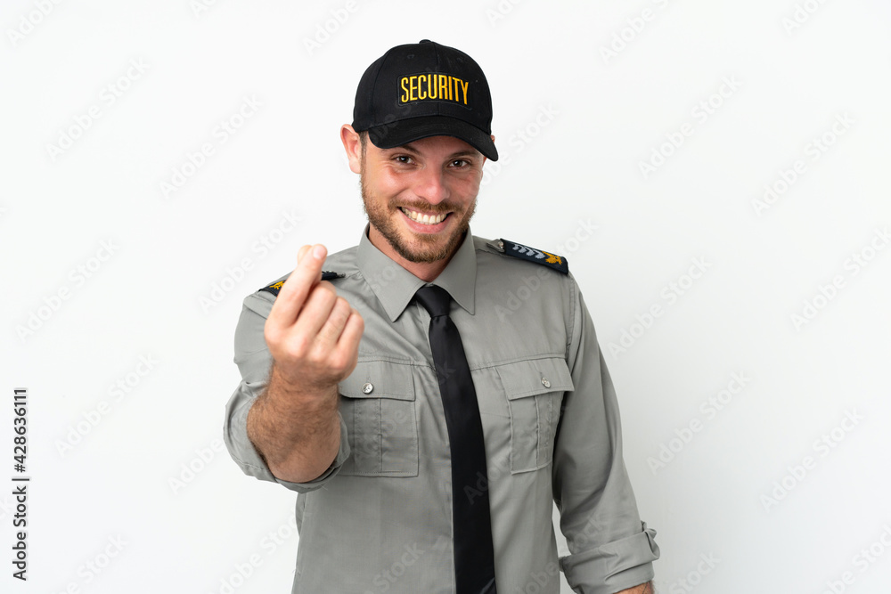 Young security Brazilian man isolated on white background making money gesture Young security Brazilian man isolated on white background making money gesture