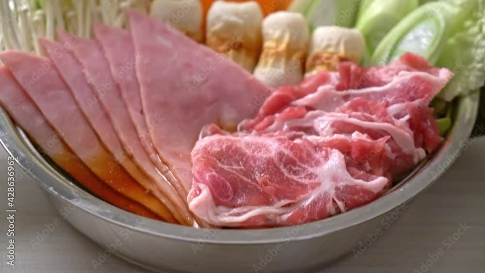sukiyaki or shabu hot pot black soup with meat raw and vegetable - Japanese food style