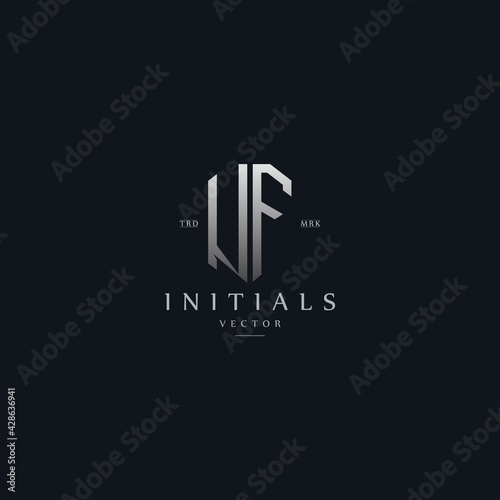 classy UF vintage metal monogram logo. elegant silver initials icon premium vector design template