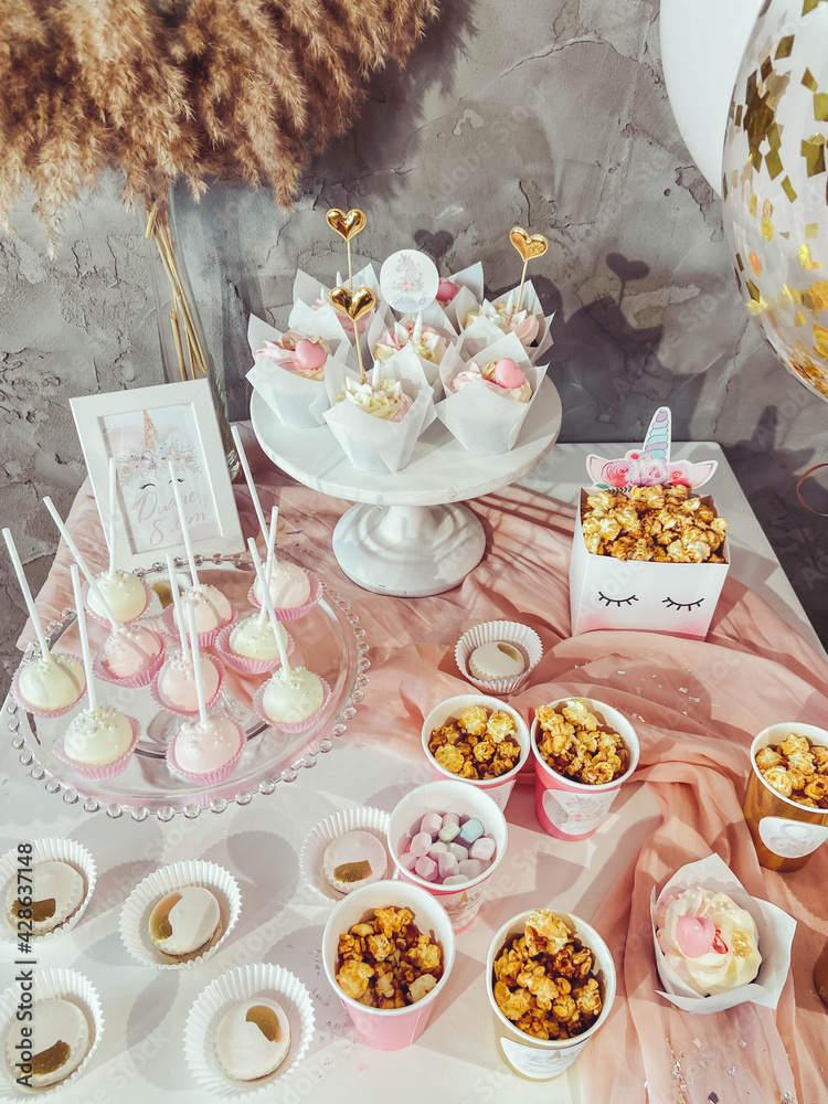 Unicorn party Candy Bar. Delicious sweet buffet. Celebratory table. Catering service. 