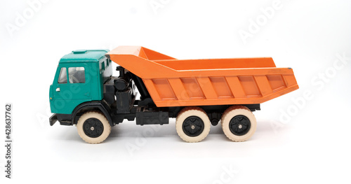 toy model of a truck from the USSR made of metal on a white background, isolated object