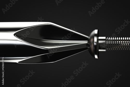 Tightening the screw with a screwdriver. Very close-up.