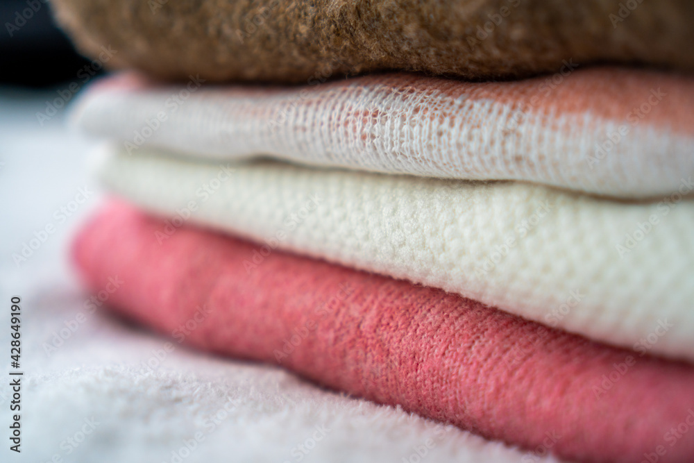 stack of pink and white clothes stack of pink and white clothes