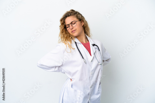 Young doctor blonde woman isolated on white background suffering from backache for having made an effort