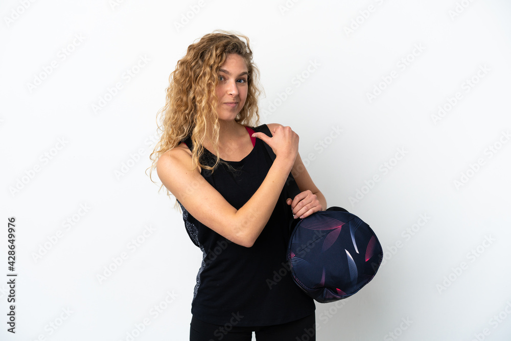 Young sport woman with sport bag isolated on white background proud and self-satisfied Young sport woman with sport bag isolated on white background proud and self-satisfied