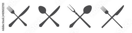 Crossed knives, spoons and forks. Vintage and modern. Vector illustration