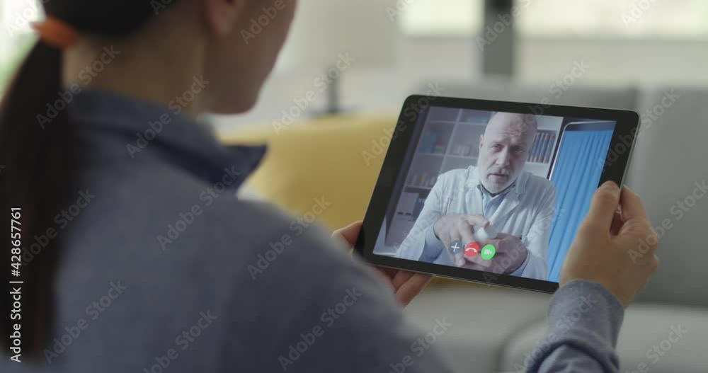Woman having a video chat with her doctor