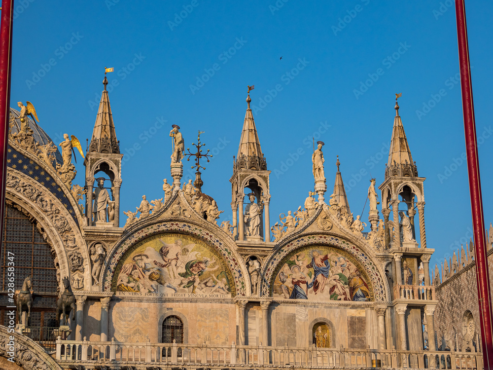St. Mark's square with iconic sights of St. Mark's basilica in Venice, Italy